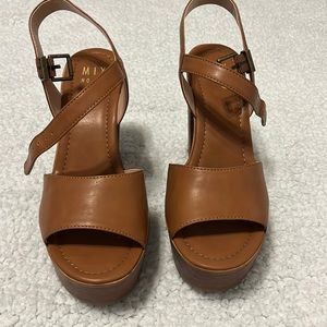 Brown heels, never worn